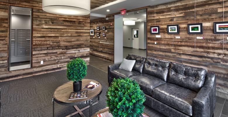 Charlotte Square lobby lounge with reclaimed wood walls