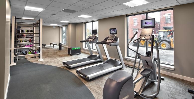Charlotte Square fitness center with cardio equipment